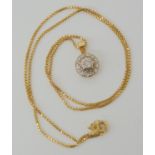 A 9ct gold box chain with a diamond flower pendant set with estimated approx 0.15cts of eight cut