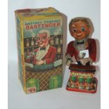 A Japanese tinplate battery operated Bartender figure in original box (af) and another 29cm high (