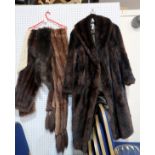 A lot comprising a long brown fur coat, an ermine stole, three dark brown fur stoles Condition