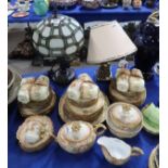 A leaded glass table lamp and Limoges blush ivory and flower decorated tea wares and others