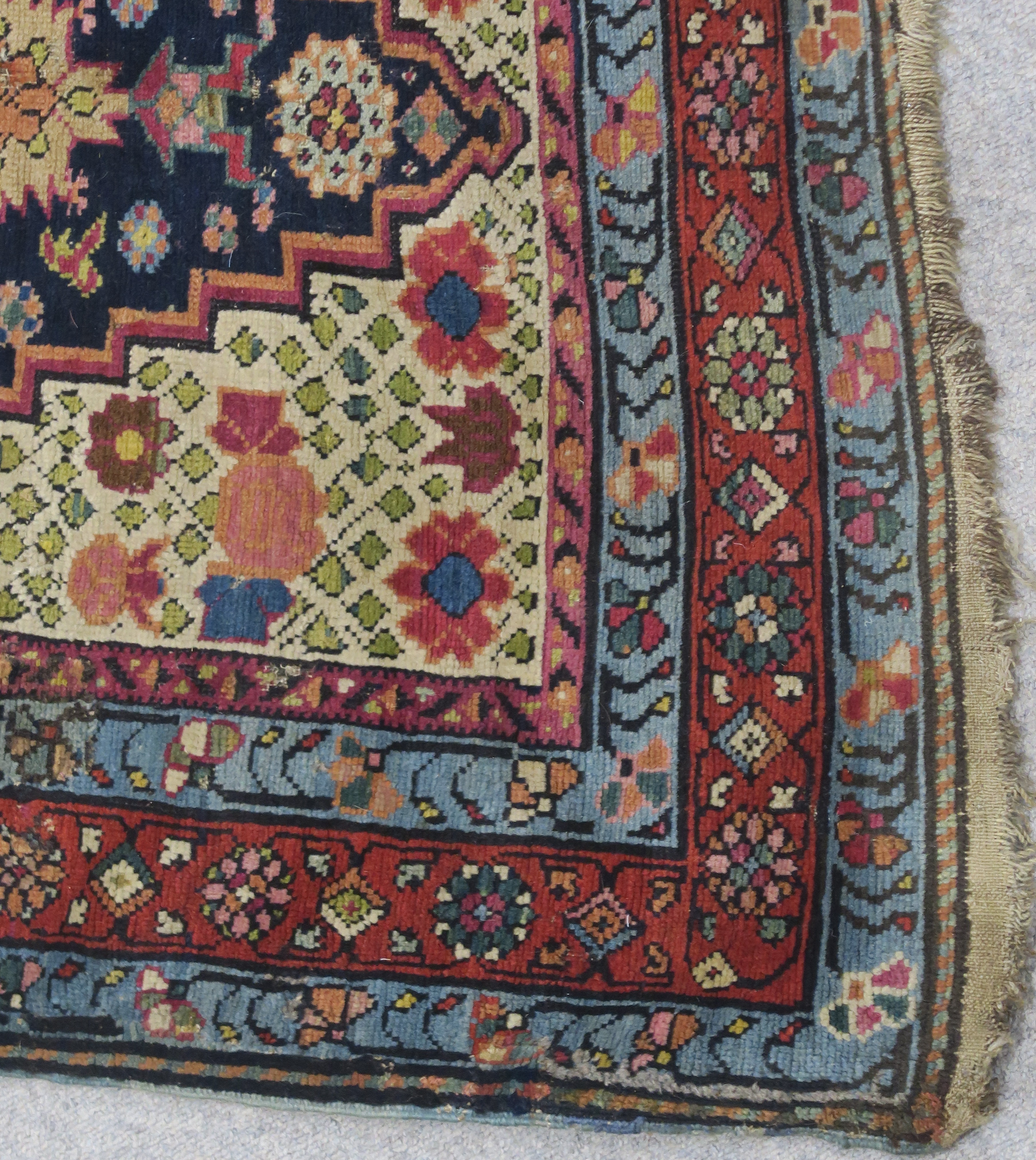 AN INDIGO GROUND PERSIAN RUNNER, with an allover geometric design, cream spandrels within blue and - Image 4 of 12