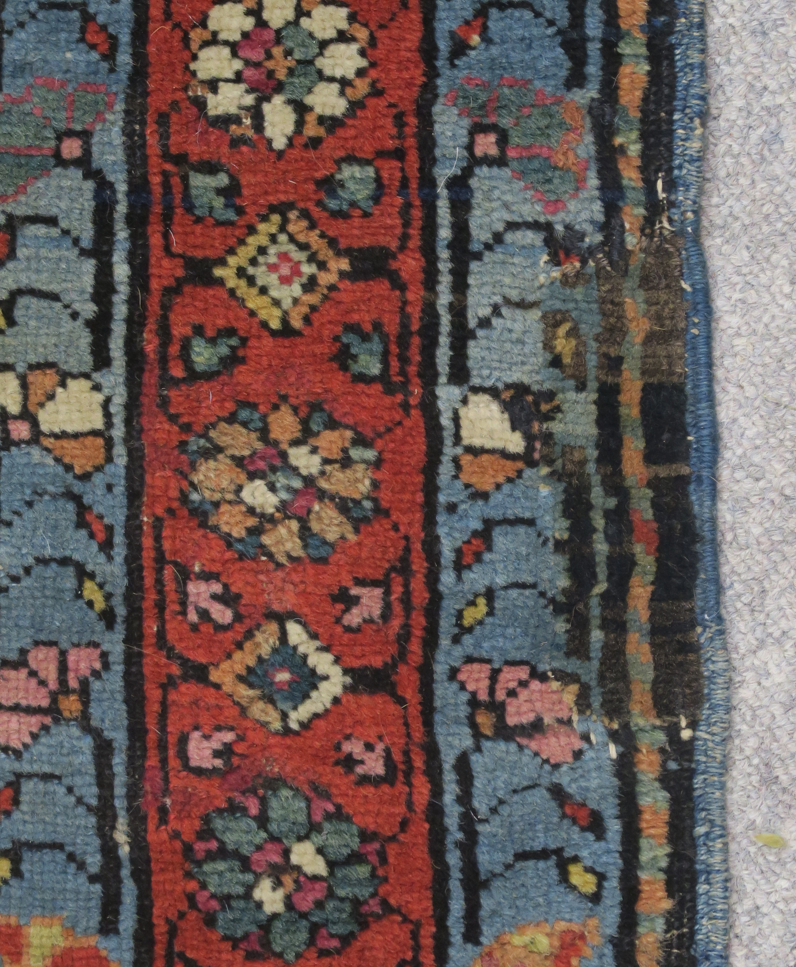 AN INDIGO GROUND PERSIAN RUNNER, with an allover geometric design, cream spandrels within blue and - Image 7 of 12