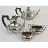 AN EDWARDIAN SILVER TEA & COFFEE SERVICE by W & G Sissons (William & George Sissons) London 1902, of