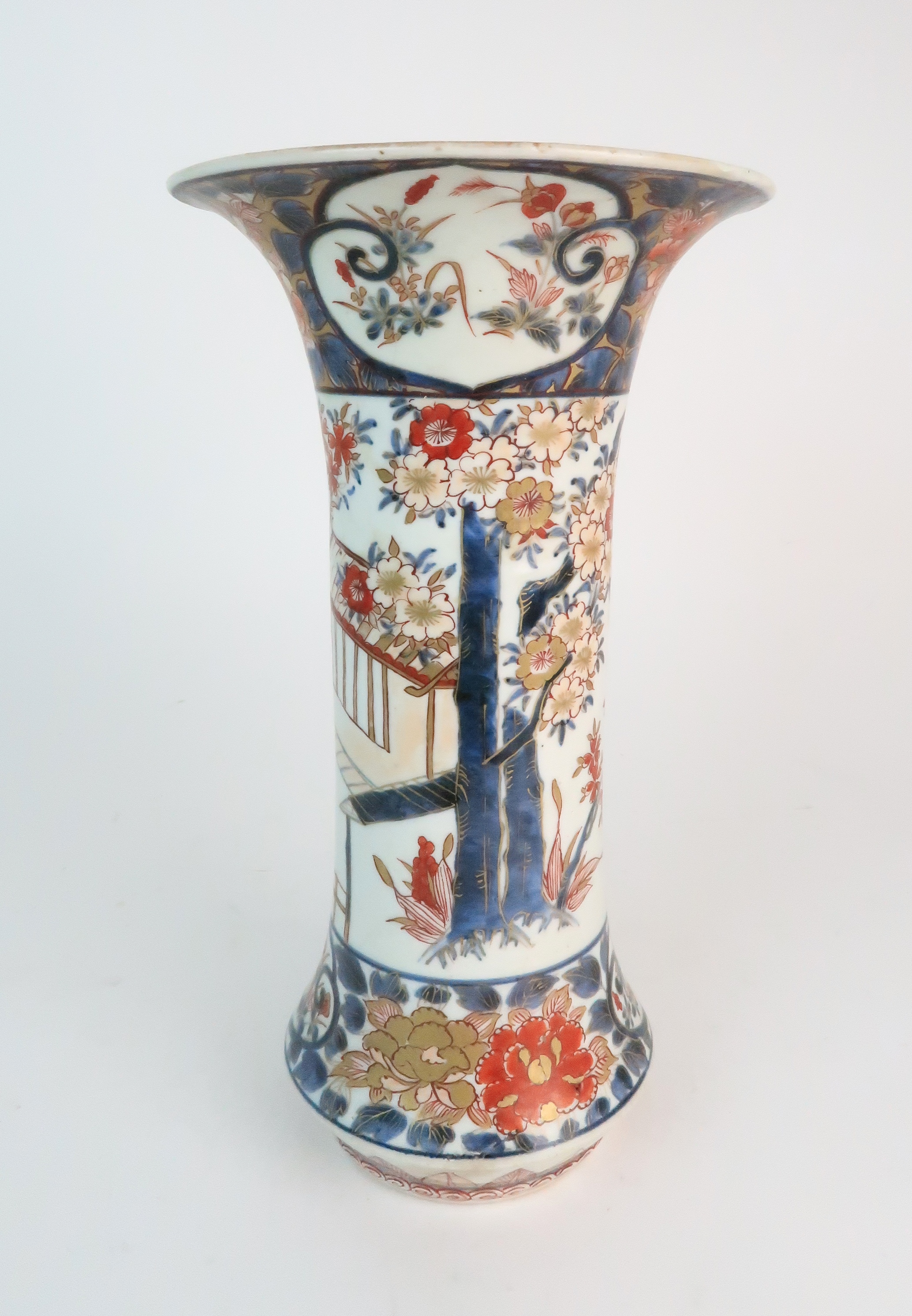 A JAPANESE IMARI FLARED CYLINDRICAL VASE painted with a building on stilts amongst flowering - Image 2 of 10