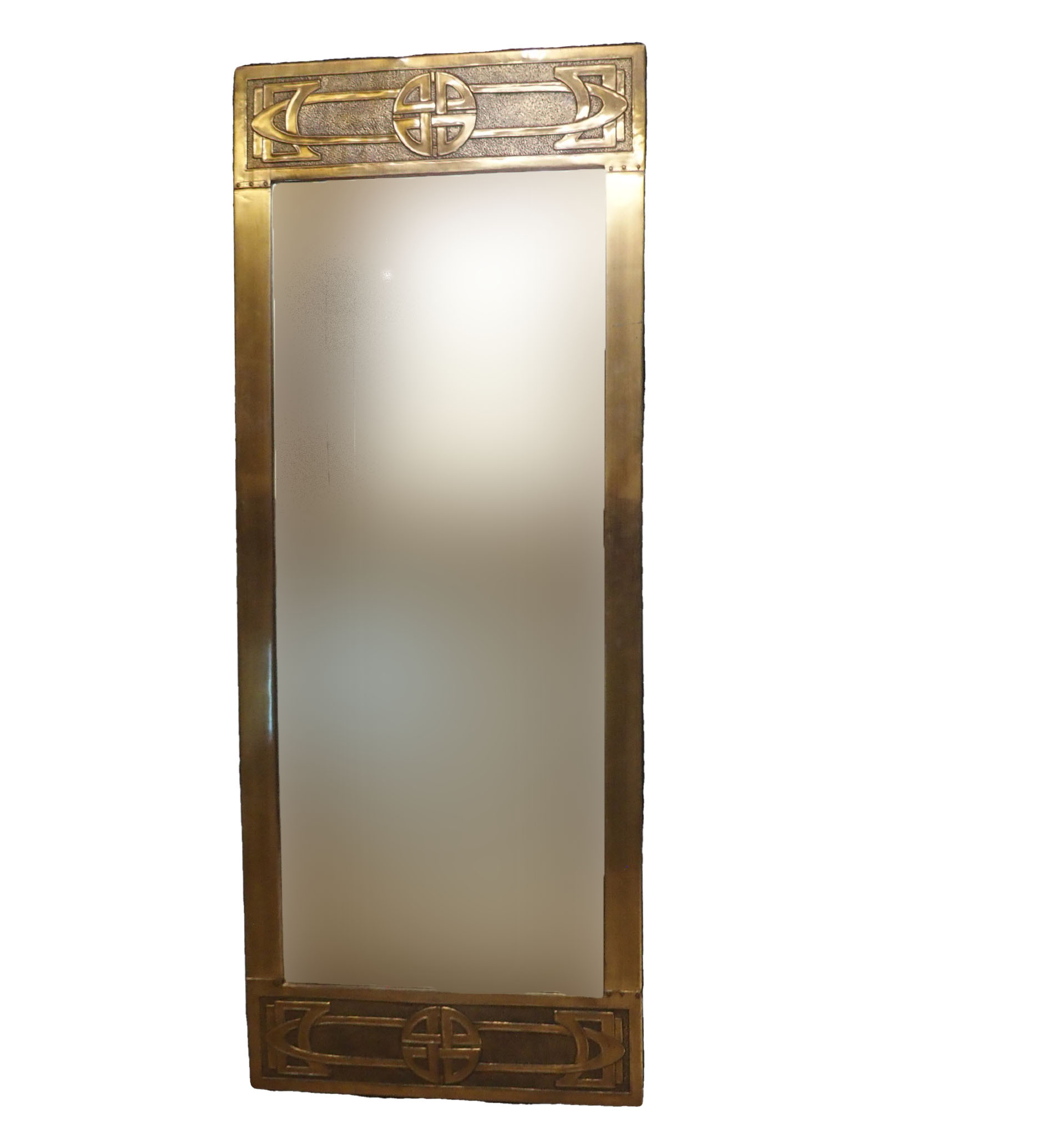 A GLASGOW SCHOOL STYLE BRASS FRAMED MIRROR of rectangular shape with knotwork decoration, 54cm x