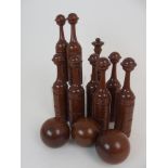 A CASED SET OF VICTORIAN SKITTLES comprising eight similar sized skittles, 22cm high and larger