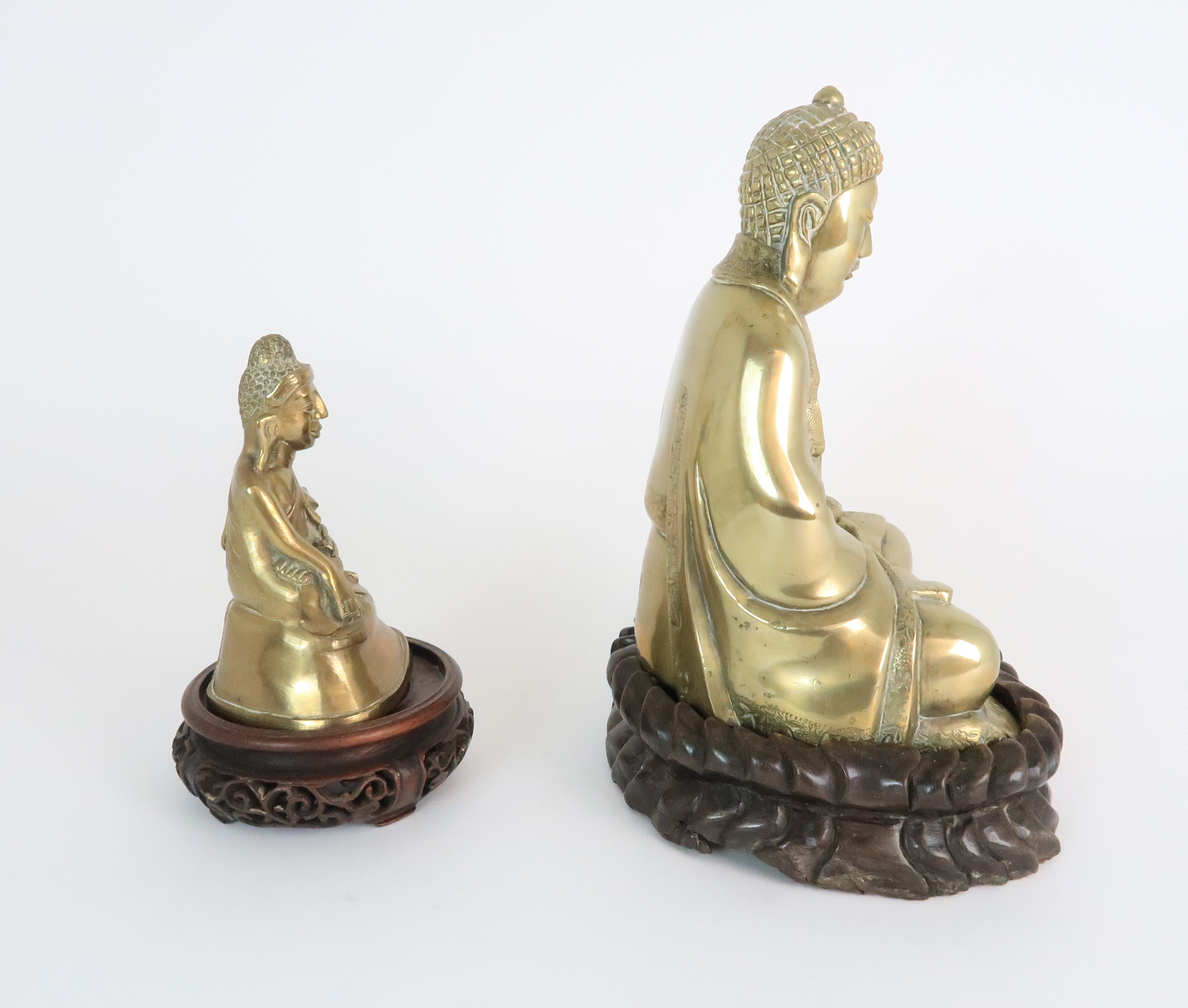 AN ASIAN BRASS MODEL OF BUDDHA seated in the lotus position and with carved wood base, 24.5cm - Image 4 of 10