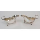 A PAIR OF SILVER SAUCEBOATS by Barker Brothers Ltd, Chester 1925, of classic shape with open