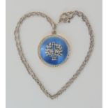 A GUILLOCHE AND DIAMOND LOCKET with diamond set basket of flowers motif, makers mark stamped