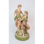 A ROYAL DUX FIGURE GROUP modelled as a farmer, with wife and young son, pink triangle to base and