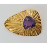 AN 18CT GOLD RETRO AMETHYST BROOCH made by Jamieson & Carry of Aberdeen, handmade and set with a
