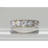 AN 18CT GOLD FIVE STONE OLD CUT DIAMOND RING set with estimated approx 0.80cts of old cut