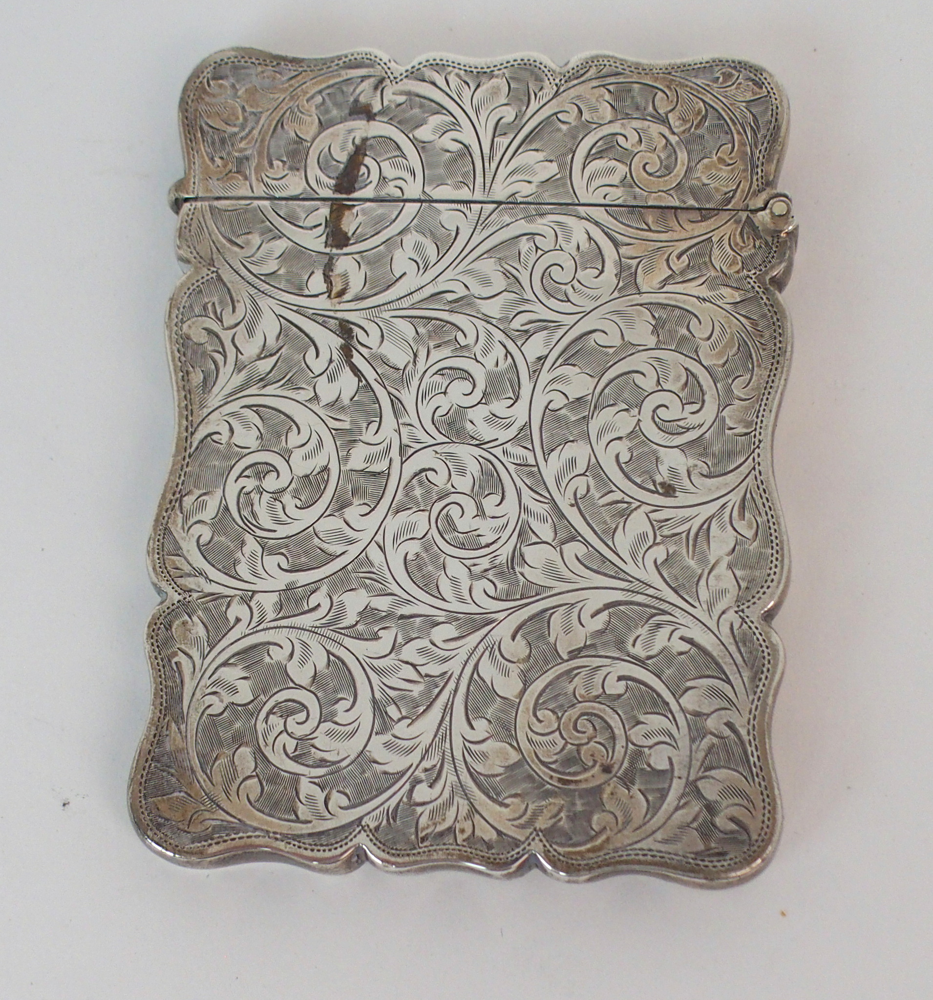 A SILVER CARD CASE by Robert Chandler, Birmingham 1920, of rectangular shape with engraved foliate - Image 5 of 7