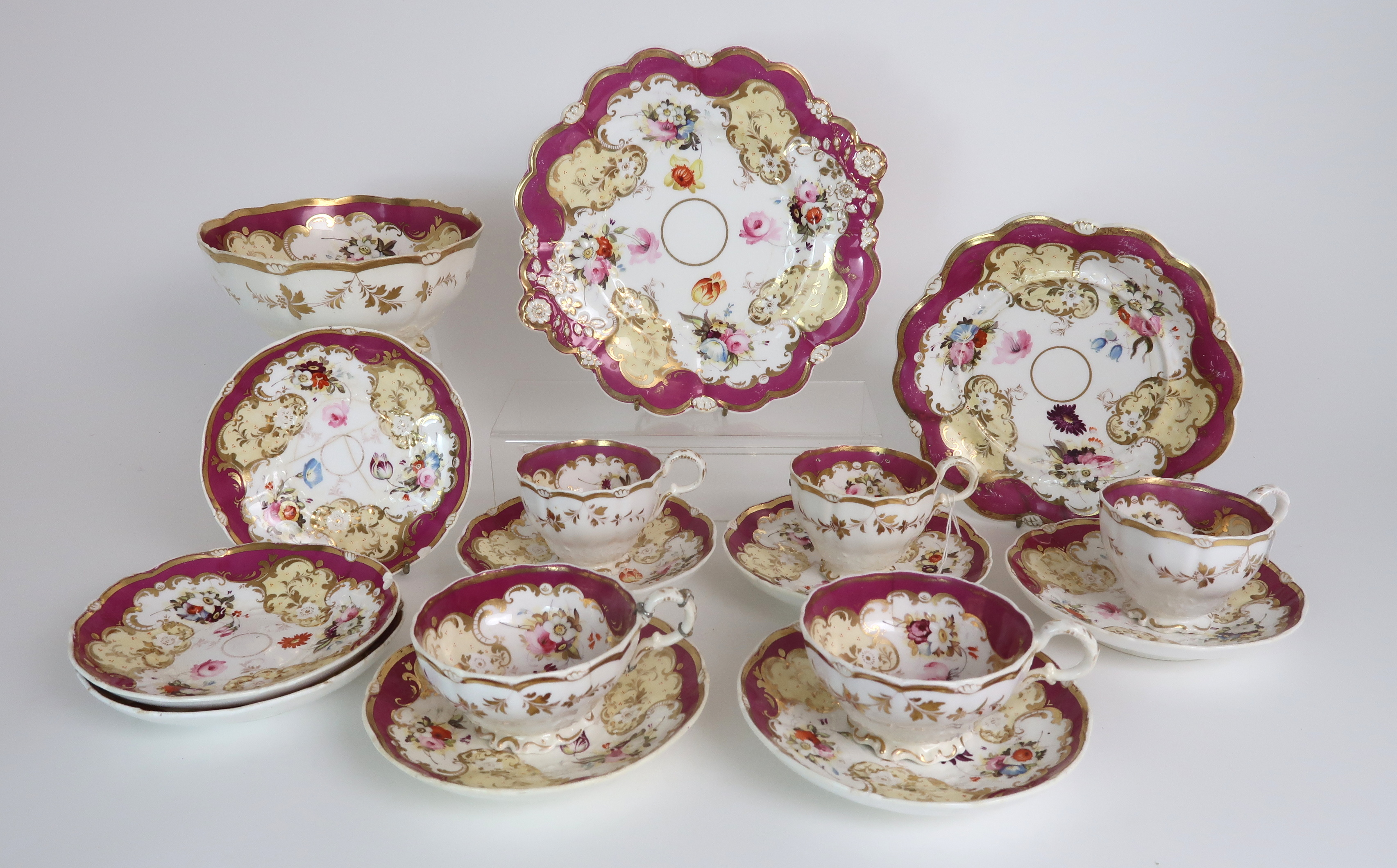 A HICKS AND MEIGH TEA AND COFFEE SET the white ground with maroon and gilt borders, surrounding