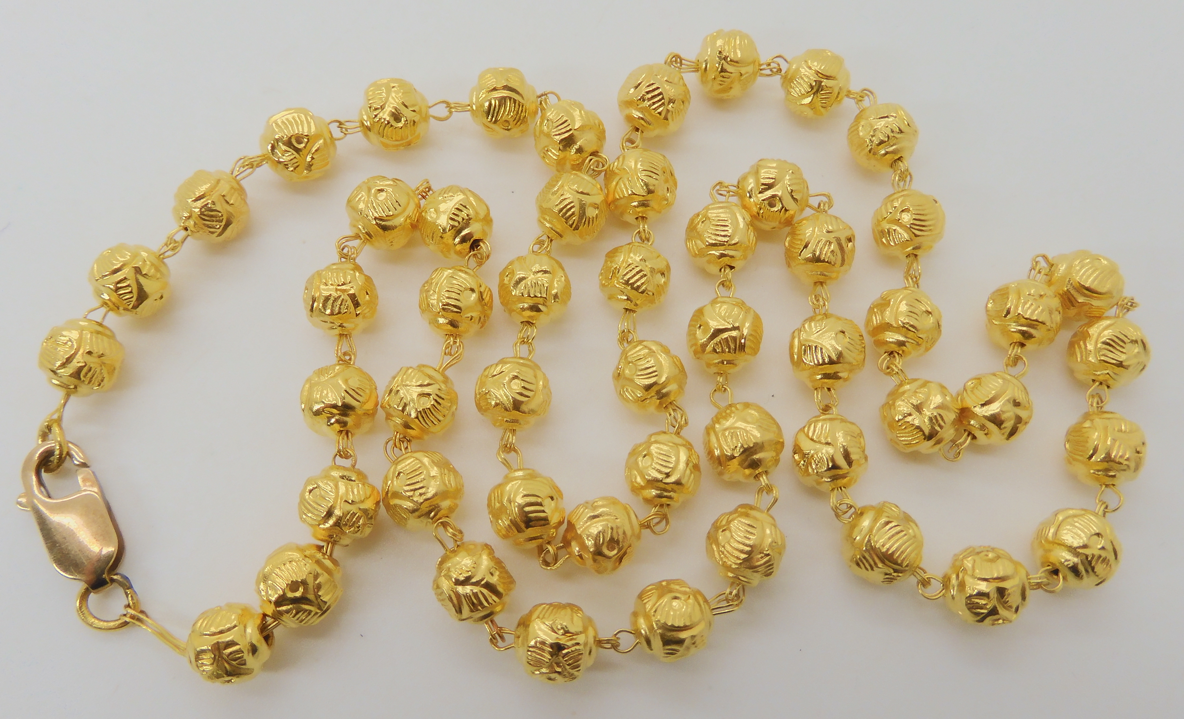 A BRIGHT YELLOW METAL BEAD NECKLACE, AND BRACELET bead necklace, is bright yellow metal with a UK, - Image 2 of 5