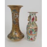 A SATSUMA TRUMPET SHAPED VASE painted with a dragon above warriors in conflict, gilt mon to vase