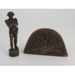 A SMALL BRONZE FIGURE OF NAPOLEON in uniform with crossed arms with screw base and an animal horn