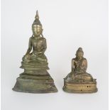A BURMESE BRONZE MODEL OF BUDDHA seated on a tall stepped base 23cm high and another model of