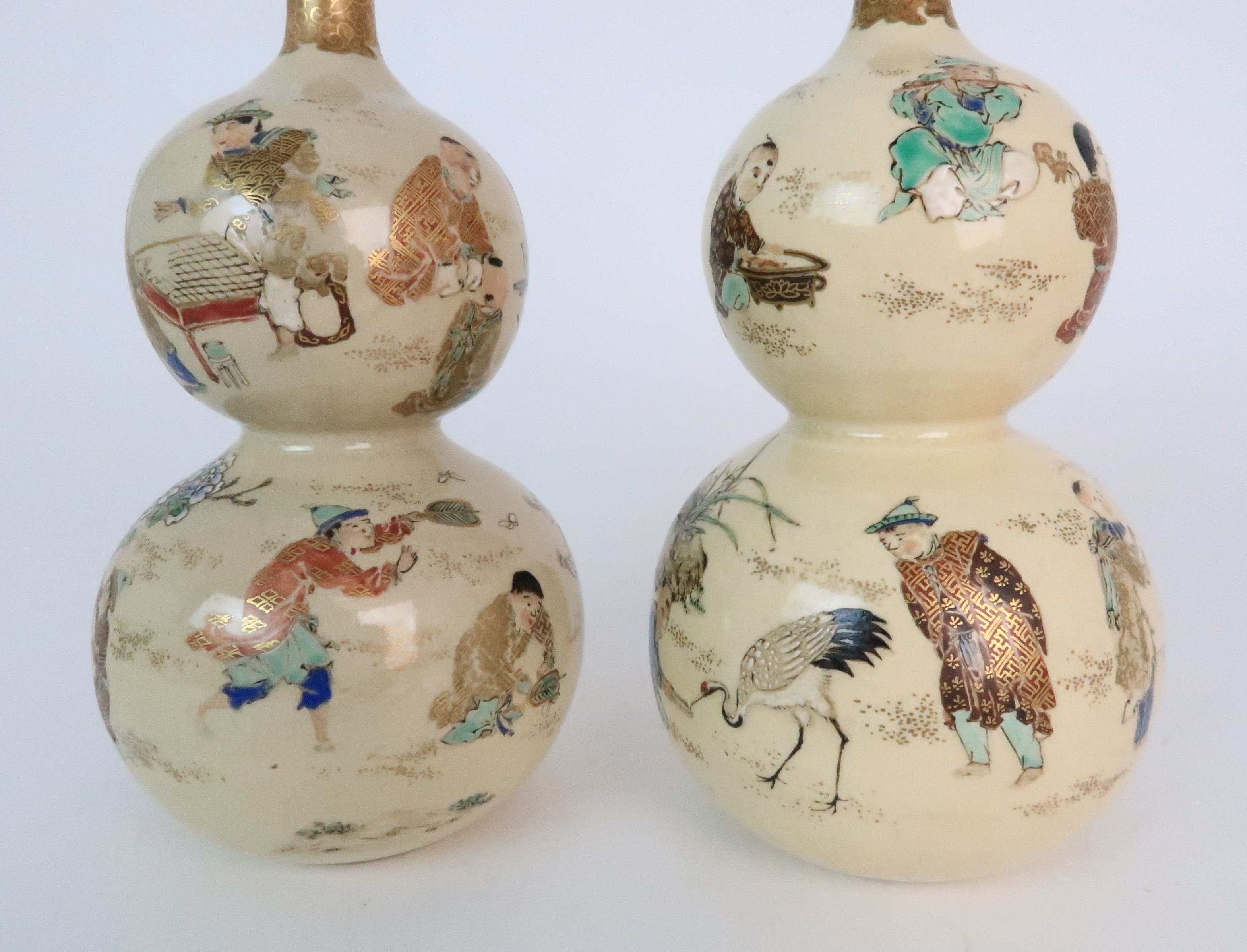 A PAIR OF SATSUMA DOUBLE GOURD VASES each painted with figures playing in gardens, with red and gilt - Image 9 of 12