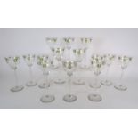 A COLLECTION OF THIRTEEN THERESIENTHAL STYLE GLASSES each with enamelled yellow stylised roses