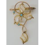 A 9CT GOLD ART NOUVEAU FRESHWATER PEARL BROOCH set with four natural pearls in cage mounts, possibly
