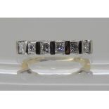 AN 18CT GOLD SIX PRINCESS CUT DIAMOND ETERNITY RING each princess cut of approximately 0.10cts, with