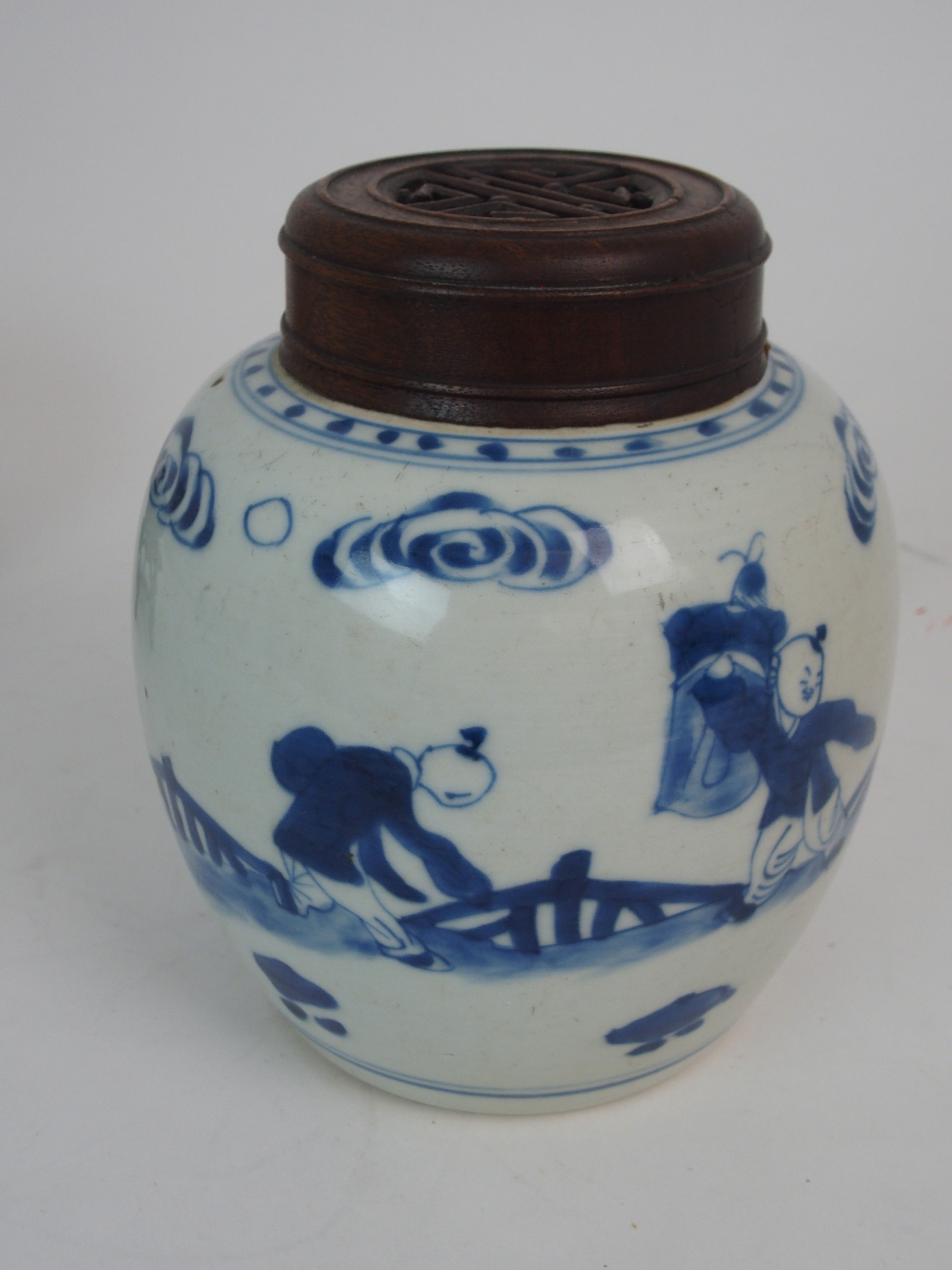 A CHINESE BLUE AND WHITE GINGER JAR painted with children at play, 15.5cm high, wood stand and cover - Image 4 of 7