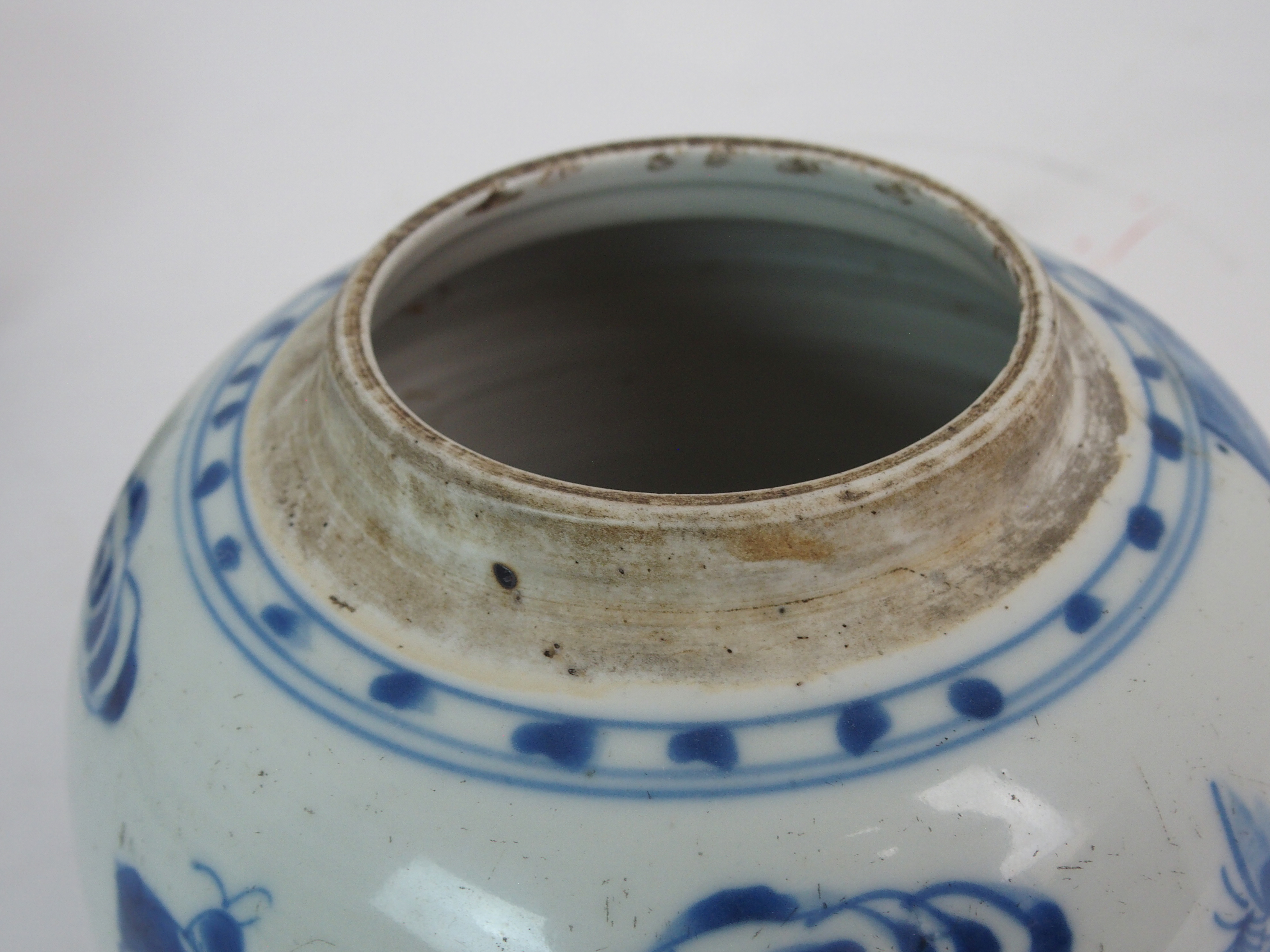 A CHINESE BLUE AND WHITE GINGER JAR painted with children at play, 15.5cm high, wood stand and cover - Image 6 of 7