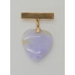 A 14K GOLD BROOCH WITH LILAC HARDSTONE HEART PENDANT dimensions of the heart 3cm x 2.5cm, weight