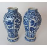 A PAIR OF CHINESE BLUE AND WHITE OCTAGONAL VASES each painted with panels of insects amongst foliage