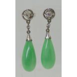 A PAIR OF CHINESE GREEN HARDSTONE AND DIAMOND DROP EARRINGS mounted in white metal the butterflies