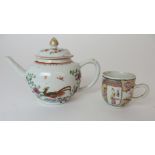 A CHINESE EXPORT TEAPOT AND COVER painted with exotic birds amongst peonies and rockwork