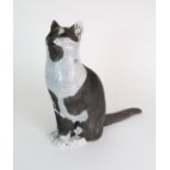 •WALTER AWLSON (SCOTTISH b 1949) A SEATED POTTERY CAT signed and numbered 3/75, 33cm high