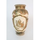 A SATSUMA BALUSTER VASE painted with panels of figures and Ho-o bird divided by a band of