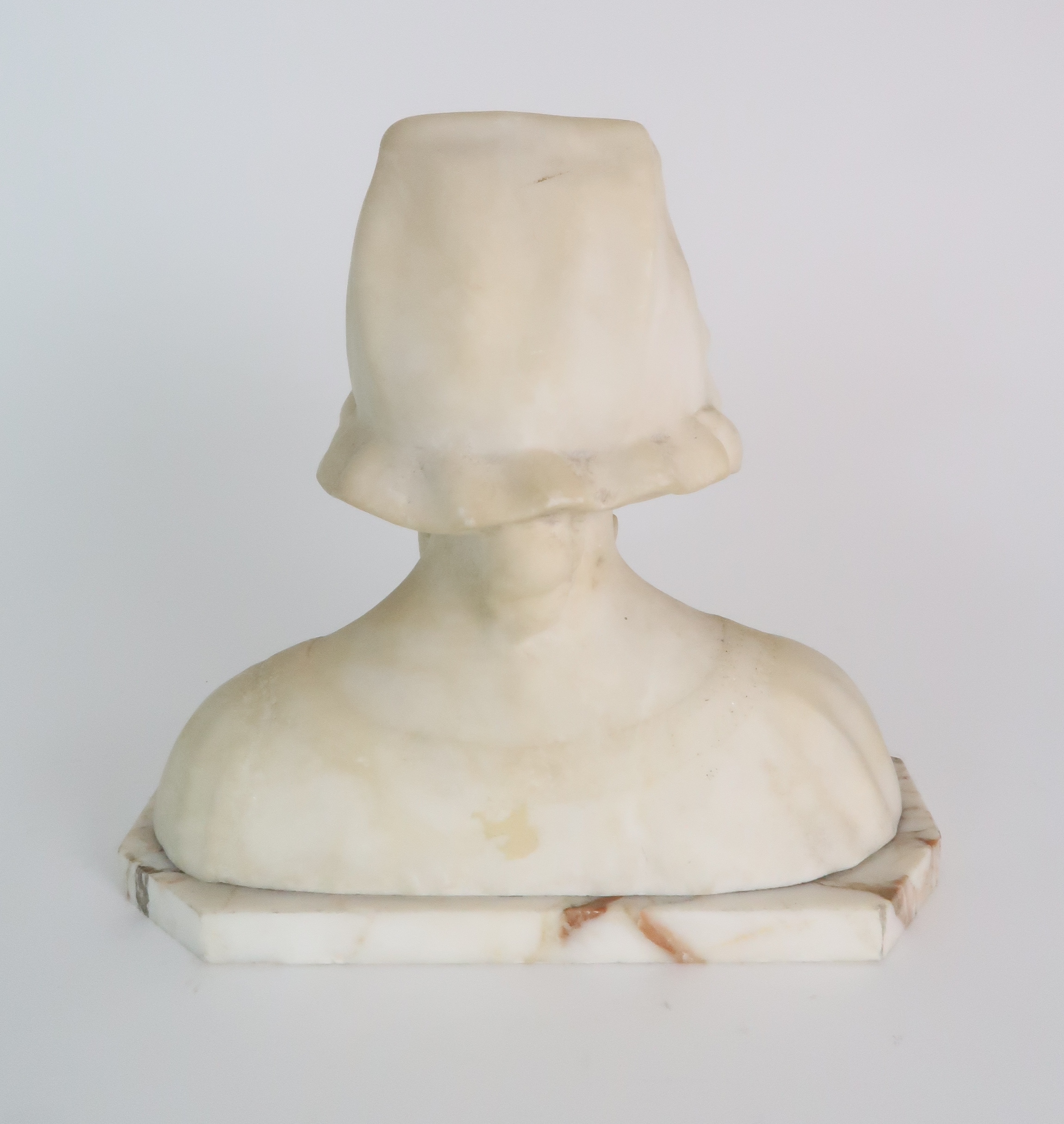 AN ALABASTER BUST OF A GIRL IN A BONNET upon onyx base, 20cm high Condition Report: Available upon - Image 3 of 6