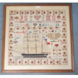 A DECORATIVE VICTORIAN SAMPLER OF A SHIP (DUNCAN RITCHIE) by Mary Stephen, 1851, framed and