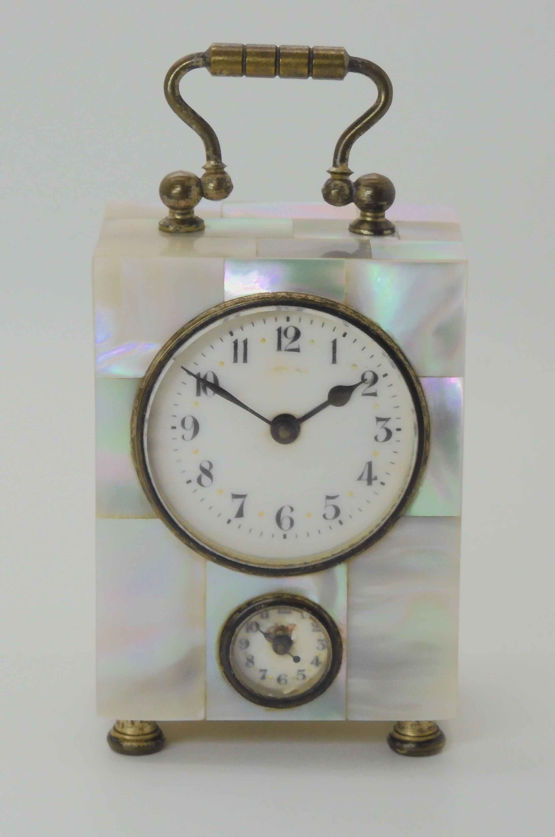 A MOTHER OF PEARL WECKER ALARM CARRIAGE CLOCK stamped D R P & G M, with a regular dial and an