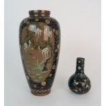 A JAPANESE CLOISONNE BALUSTER VASE finely decorated with panels of birds, butterflies, plants and