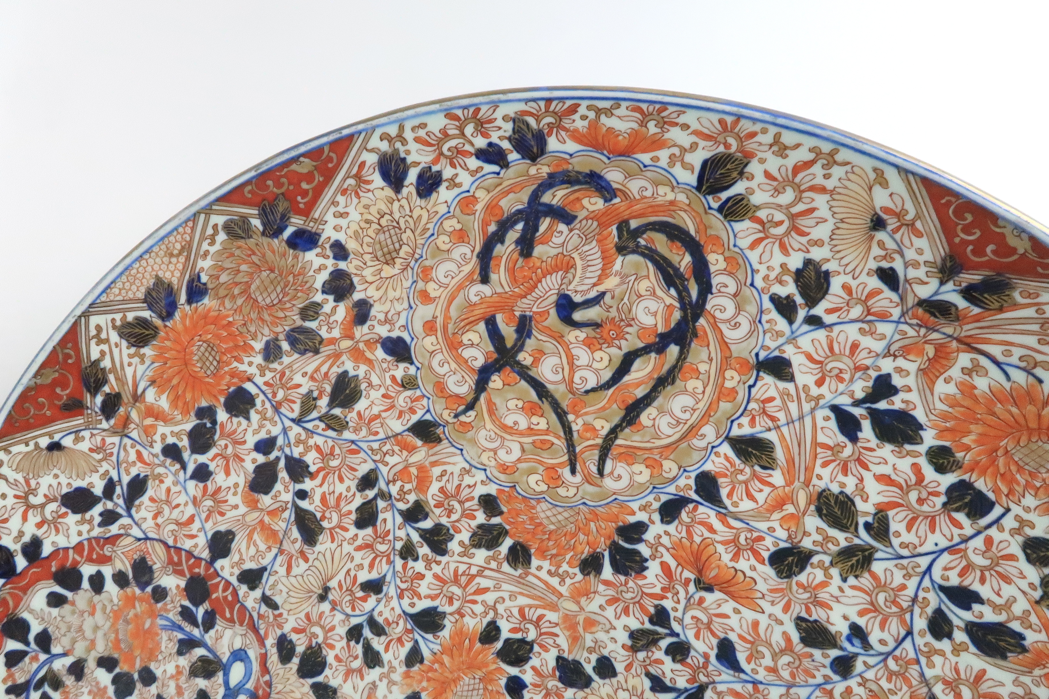 A LARGE IMARI CHARGER painted with birds, scrolling foliage and ribbon tied roundels with Ho-o - Image 2 of 9