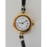 A 15CT GOLD LADIES VINTAGE WATCH diameter of the case 2.7cm, hallmarked London import 1919, with