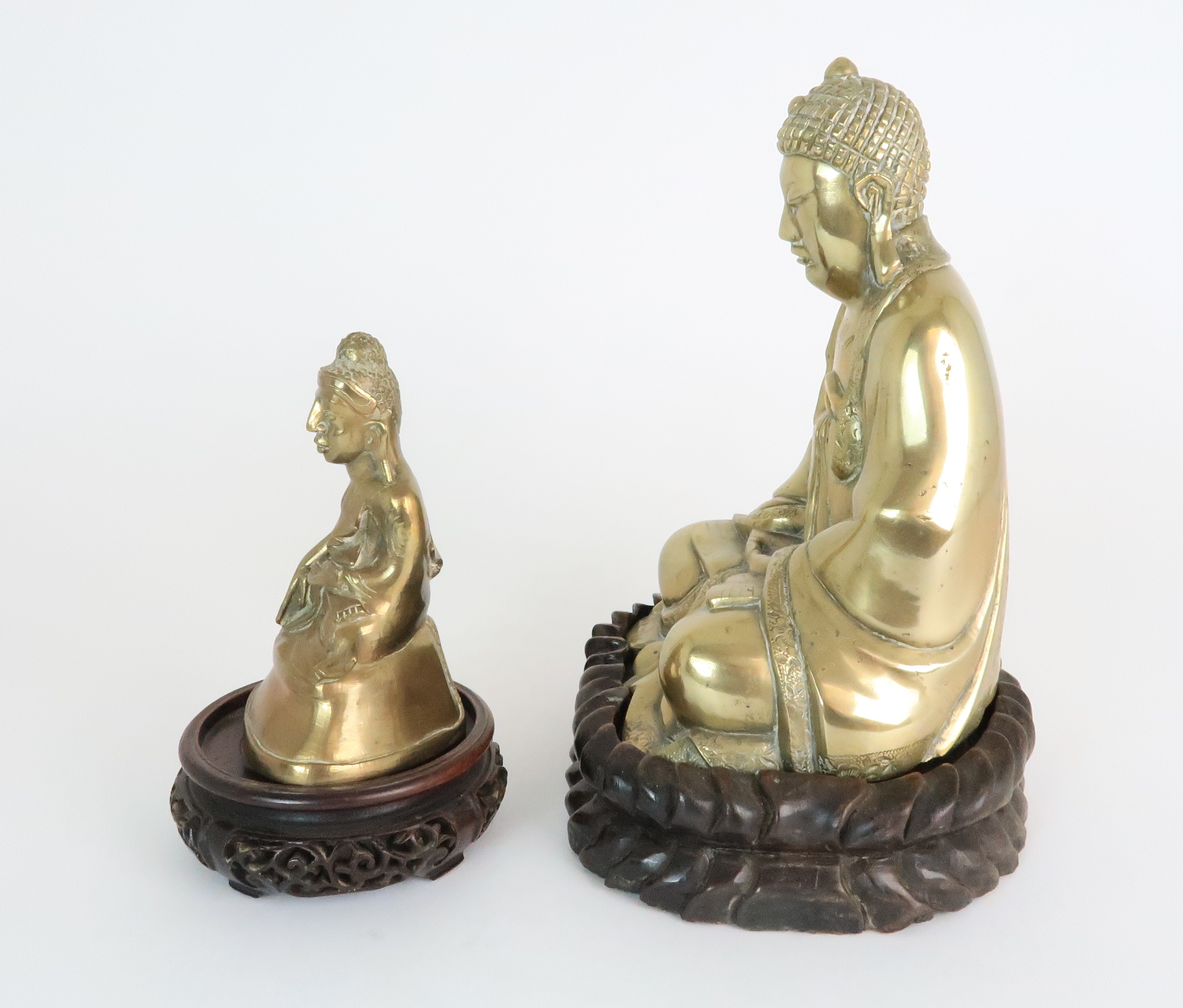 AN ASIAN BRASS MODEL OF BUDDHA seated in the lotus position and with carved wood base, 24.5cm - Image 2 of 10