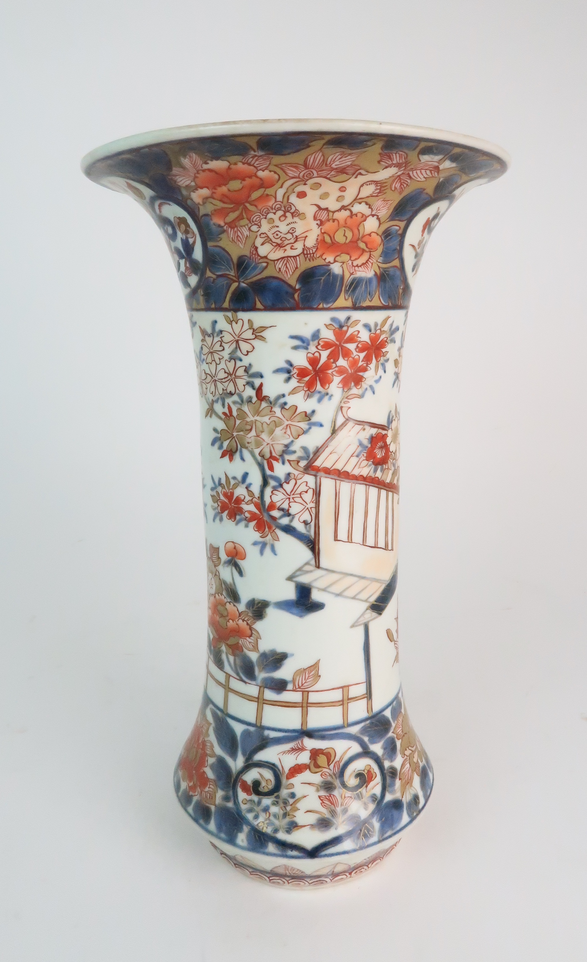 A JAPANESE IMARI FLARED CYLINDRICAL VASE painted with a building on stilts amongst flowering - Image 4 of 10