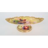 A ROYAL WORCESTER TAZZA of oval shape with shell handles, painted with blackberries and signed by