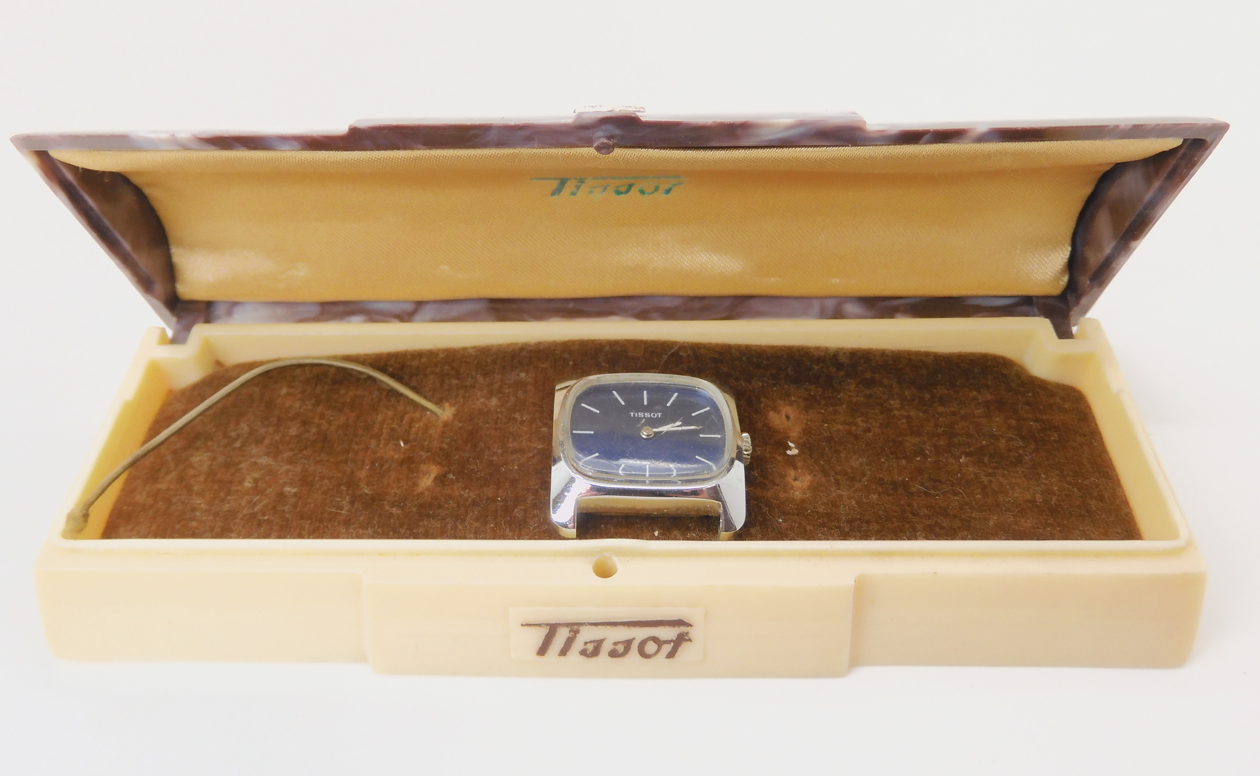 A LADIES TISSOT WATCH HEAD IN ORIGINAL BOX with metallic blue dial, white baton numerals and