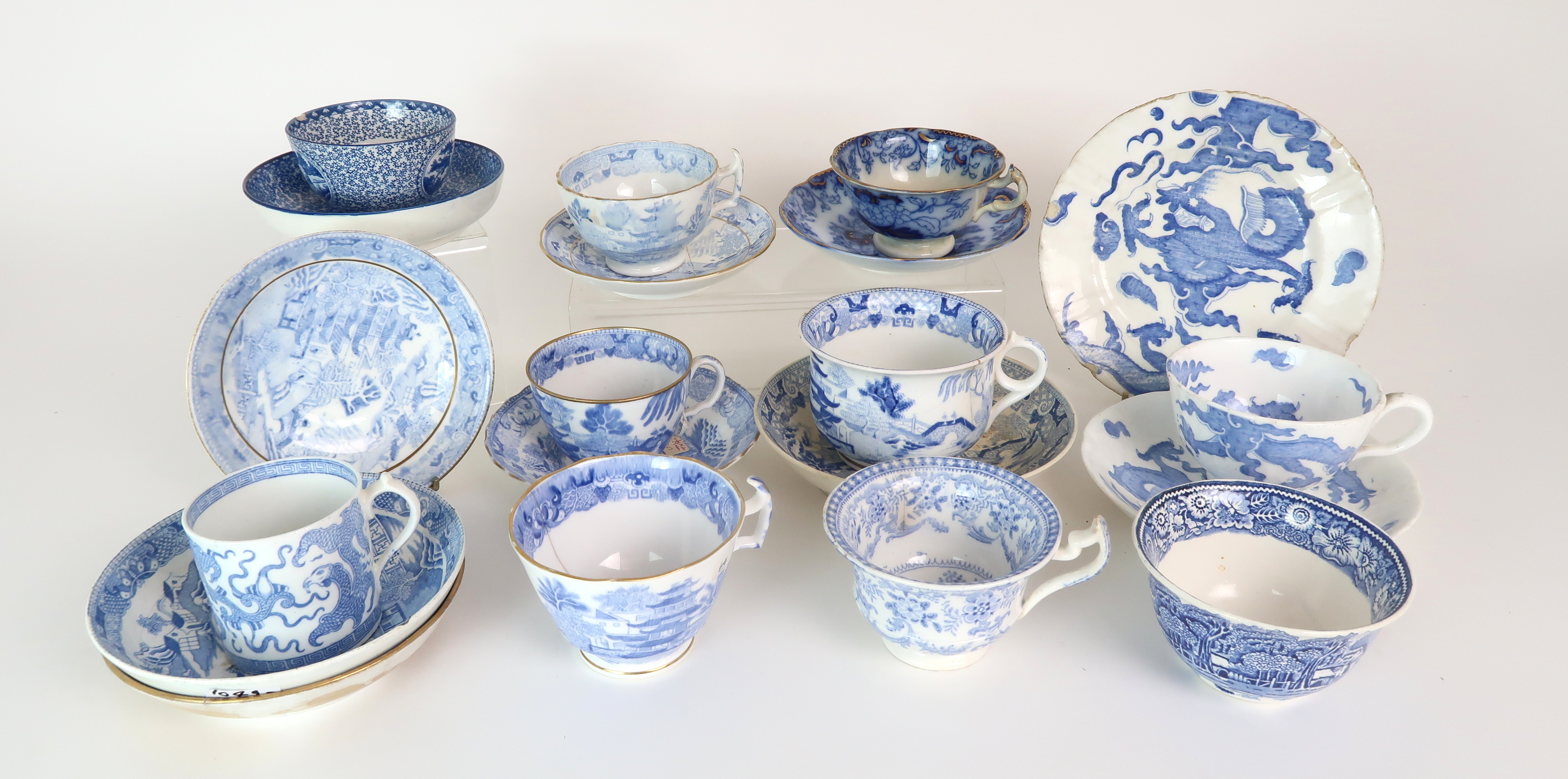 A COLLECTION OF ANTIQUE AND LATER ENGLISH BLUE AND WHITE PORCELAIN TEA/COFFEE WARES including