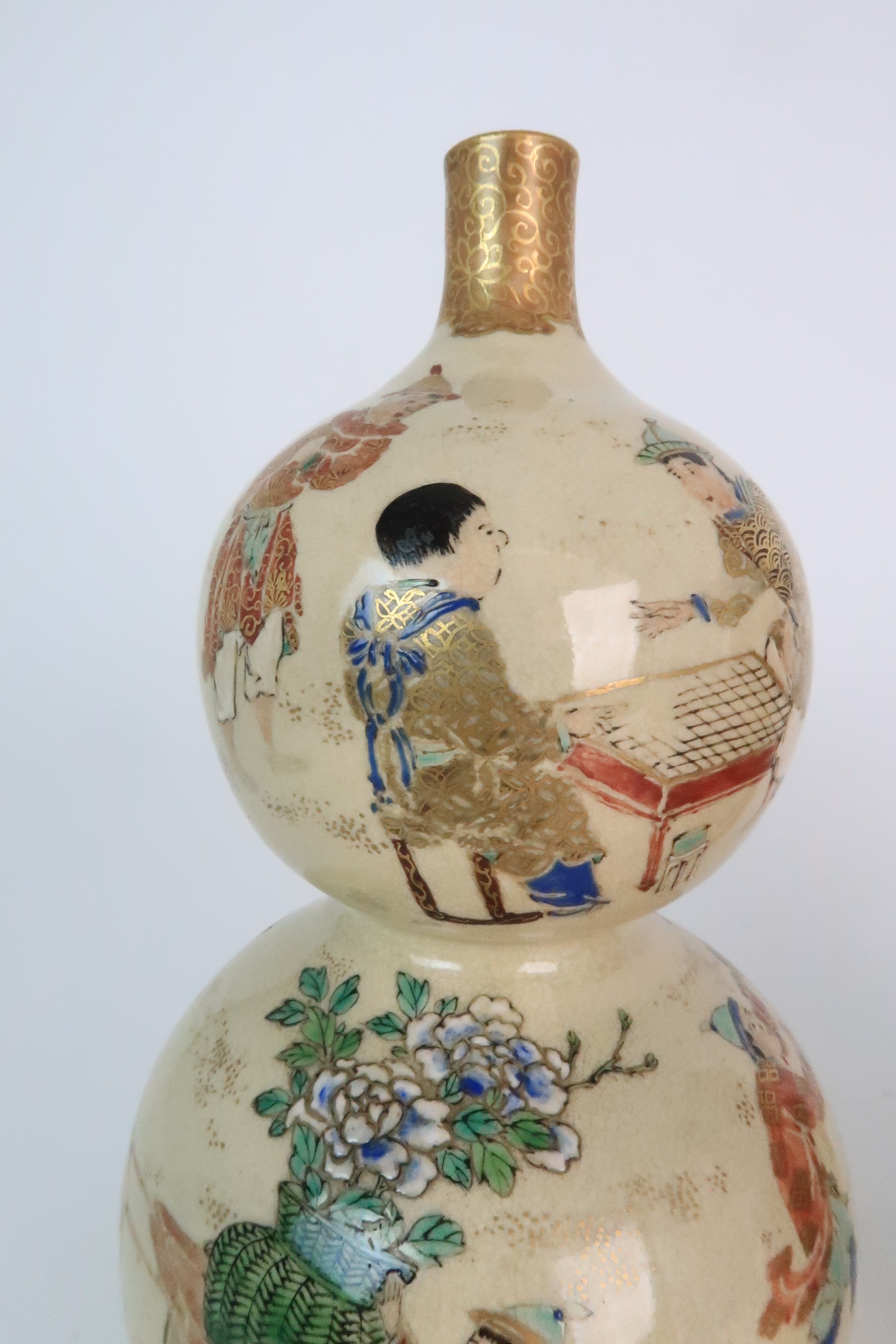 A PAIR OF SATSUMA DOUBLE GOURD VASES each painted with figures playing in gardens, with red and gilt - Image 10 of 12