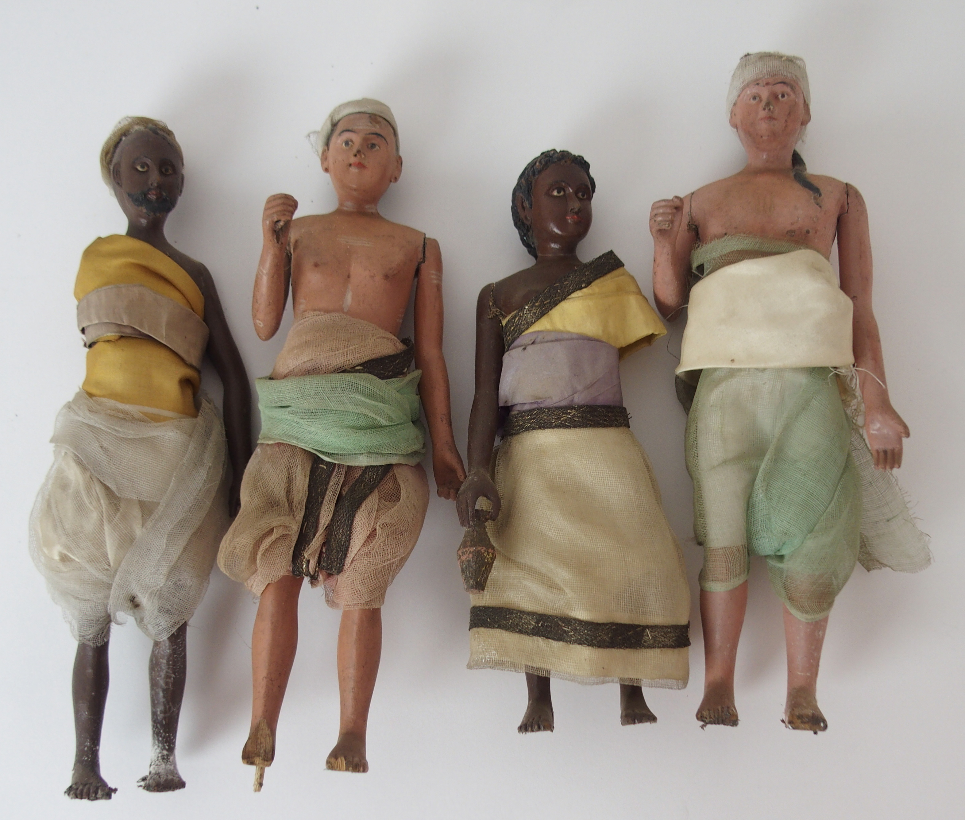 TEN INDIAN PAINTED WOOD FIGURES each native figure standing and wearing traditional dress, mounted - Image 2 of 13