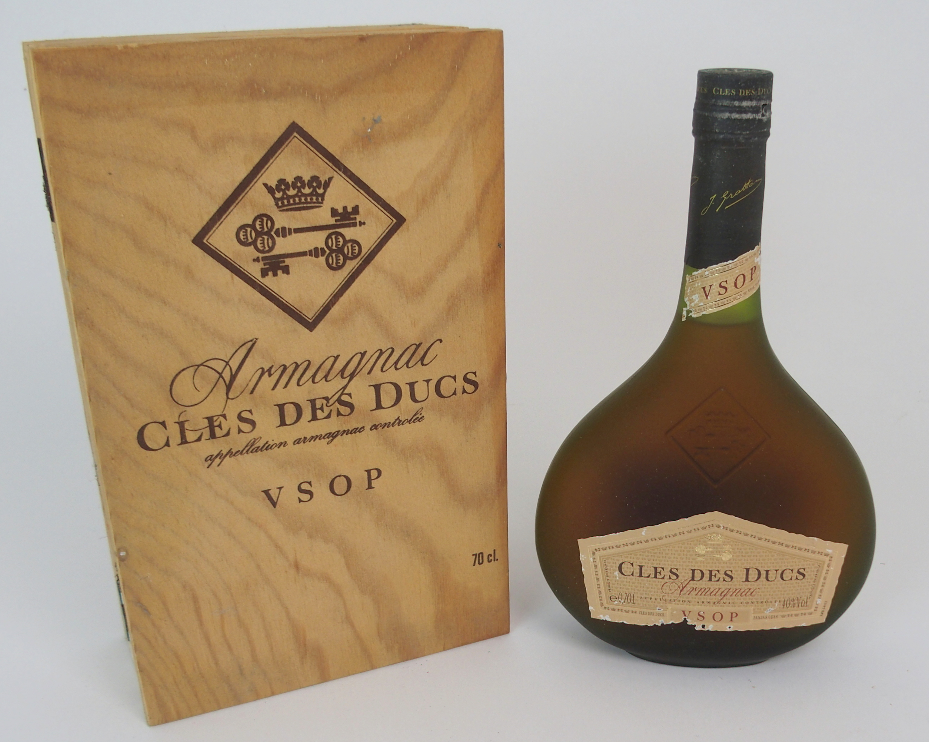 A BOTTLE OF CLES DES DUCS 40%vol, 0.70l in wood case Condition Report: Available upon request