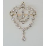 A SUBSTANTIAL EDWARDIAN DIAMOND DROP PENDANT BROOCH set with estimated approx 4.57cts of old