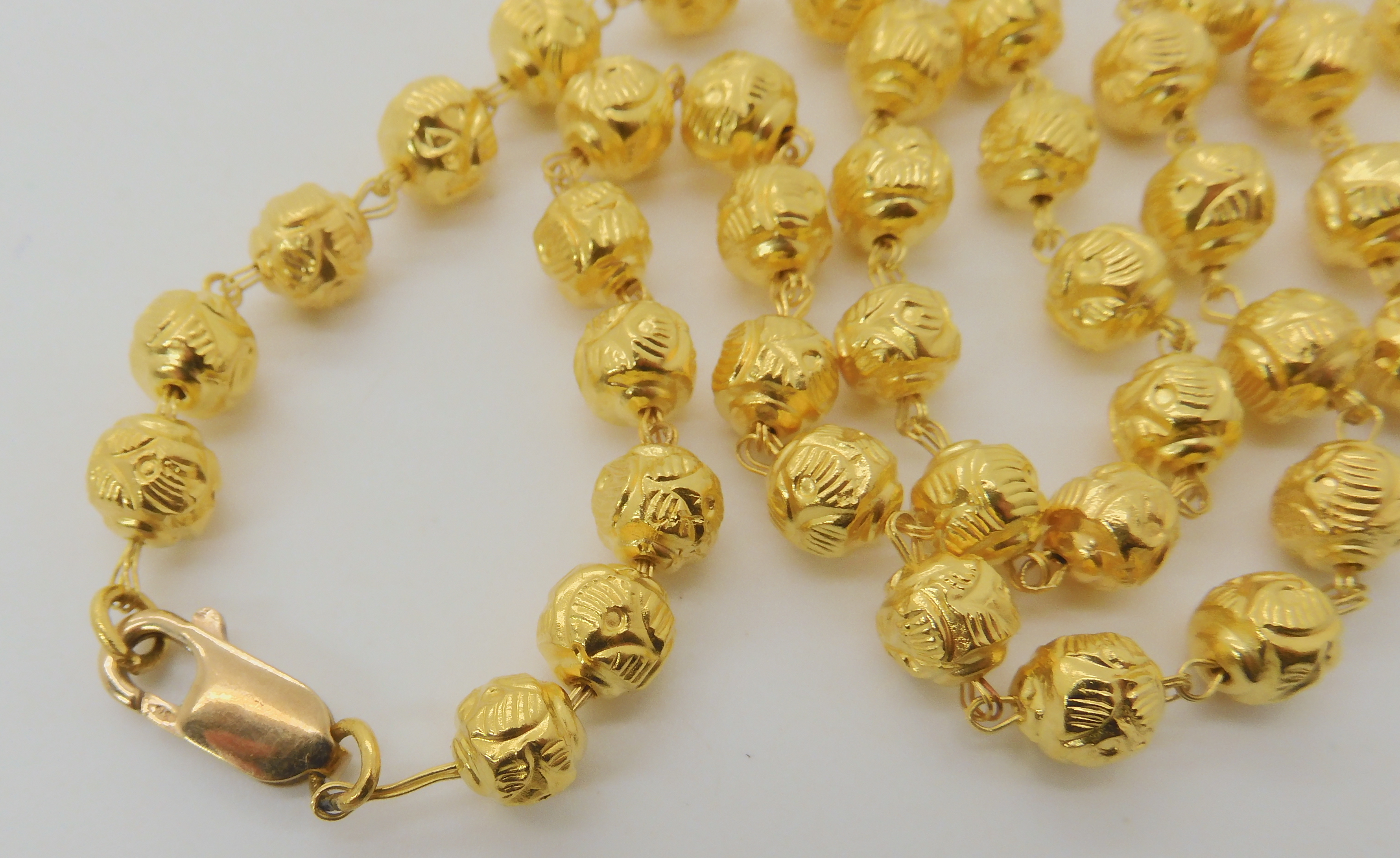 A BRIGHT YELLOW METAL BEAD NECKLACE, AND BRACELET bead necklace, is bright yellow metal with a UK, - Image 3 of 5